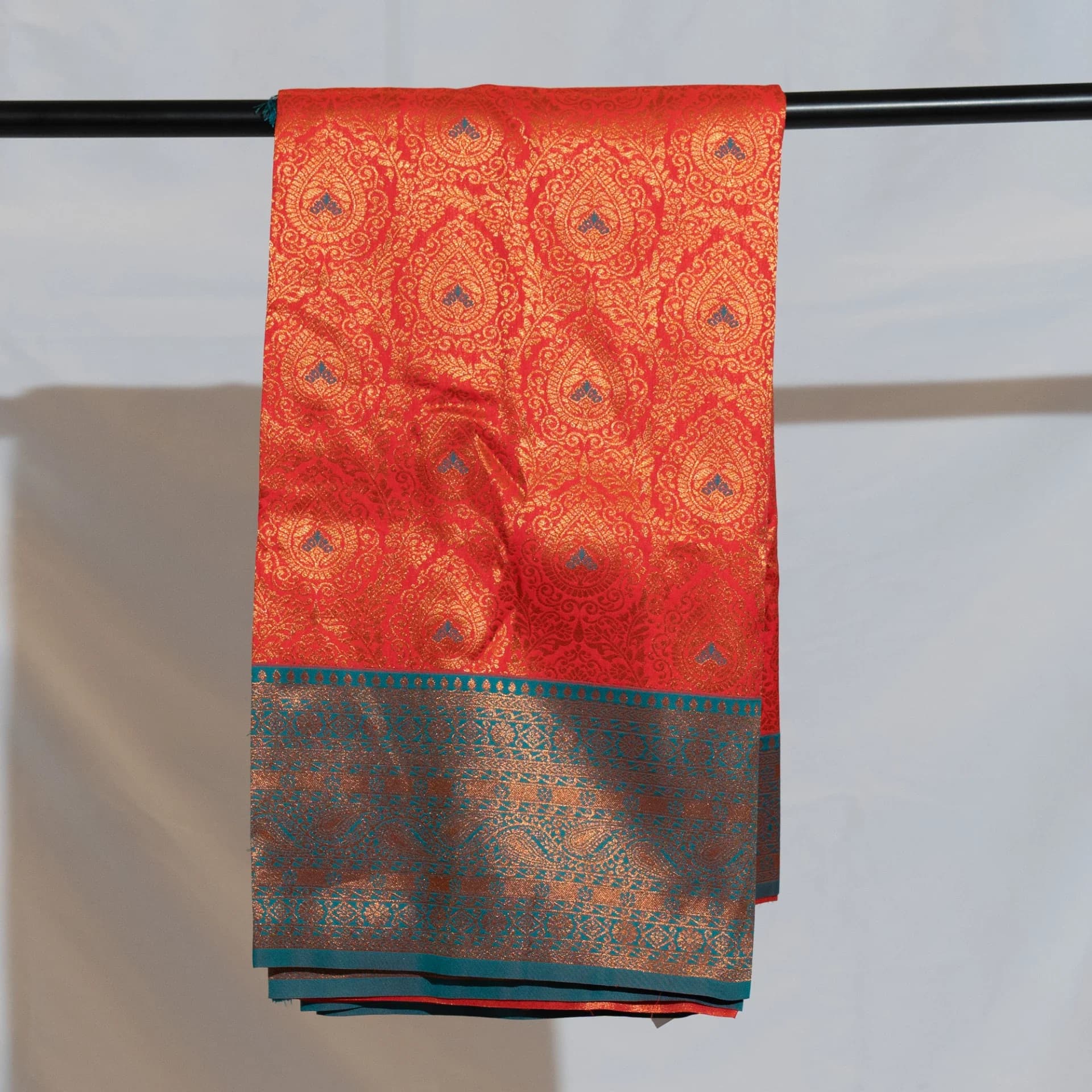 Red Brocade Saree with Contrast Teal Pallu & Two Blouse Pieces