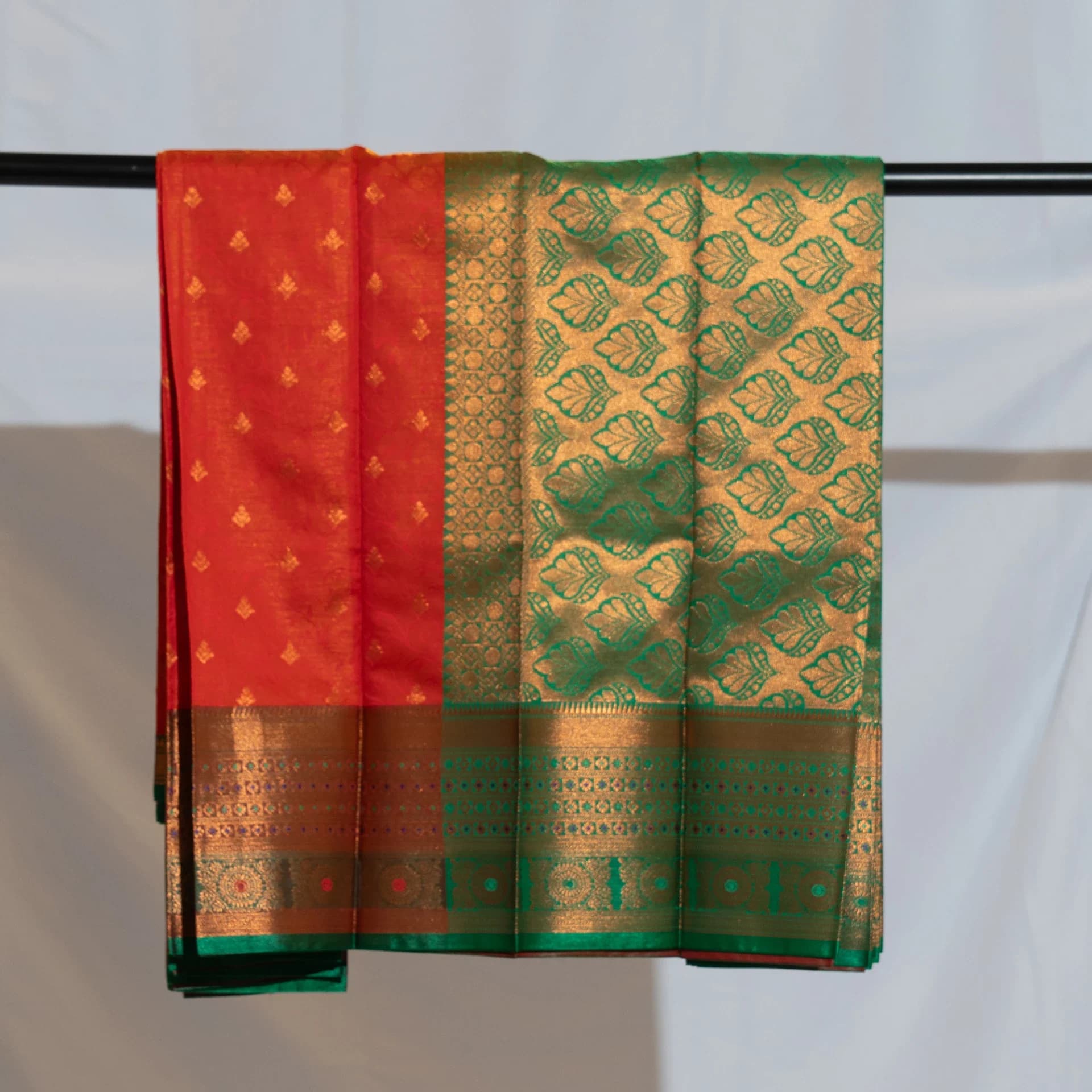 Deep Orange Saree with Copper Work & Contrast Green Pallu