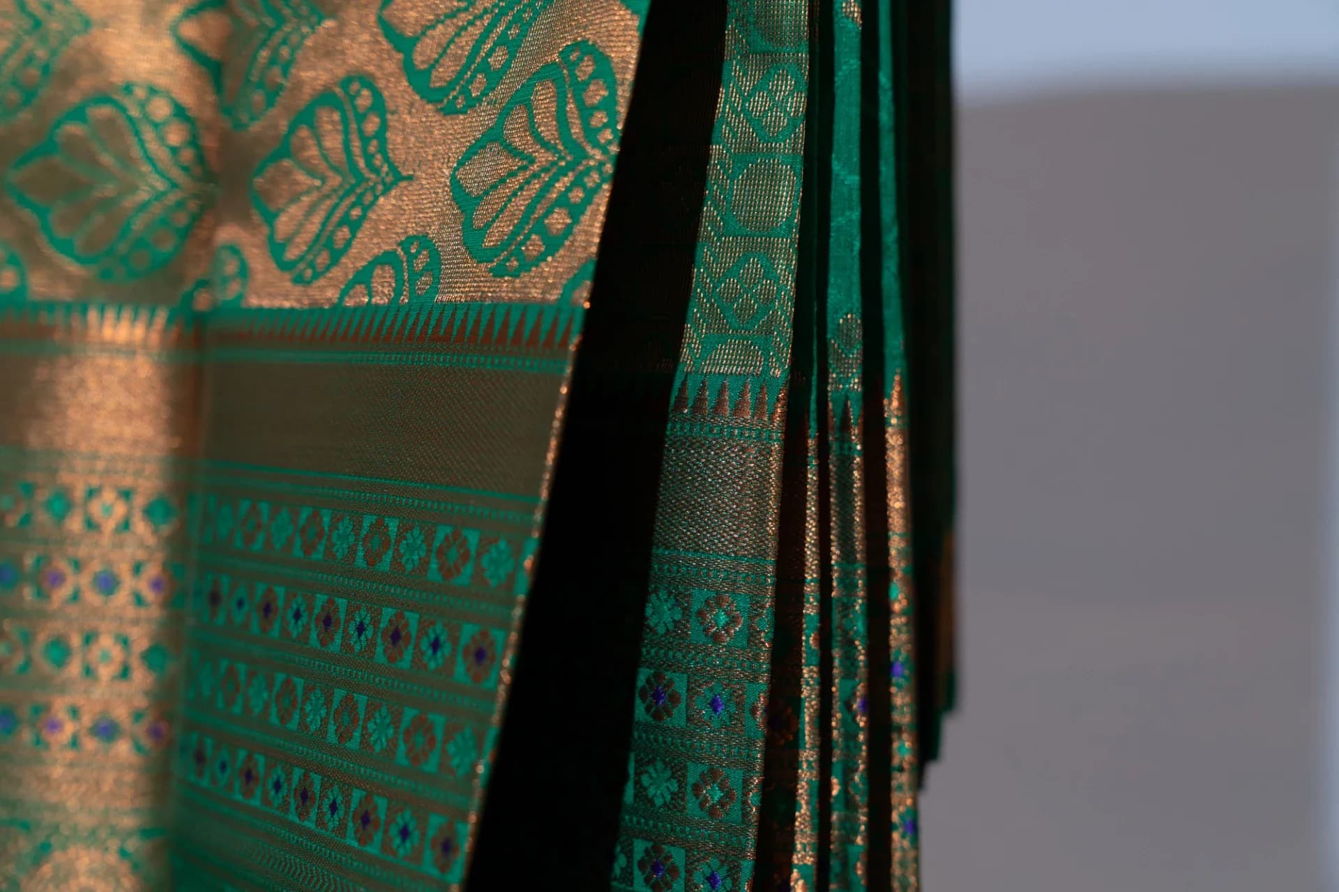 Deep Orange Saree with Copper Work & Contrast Green Pallu