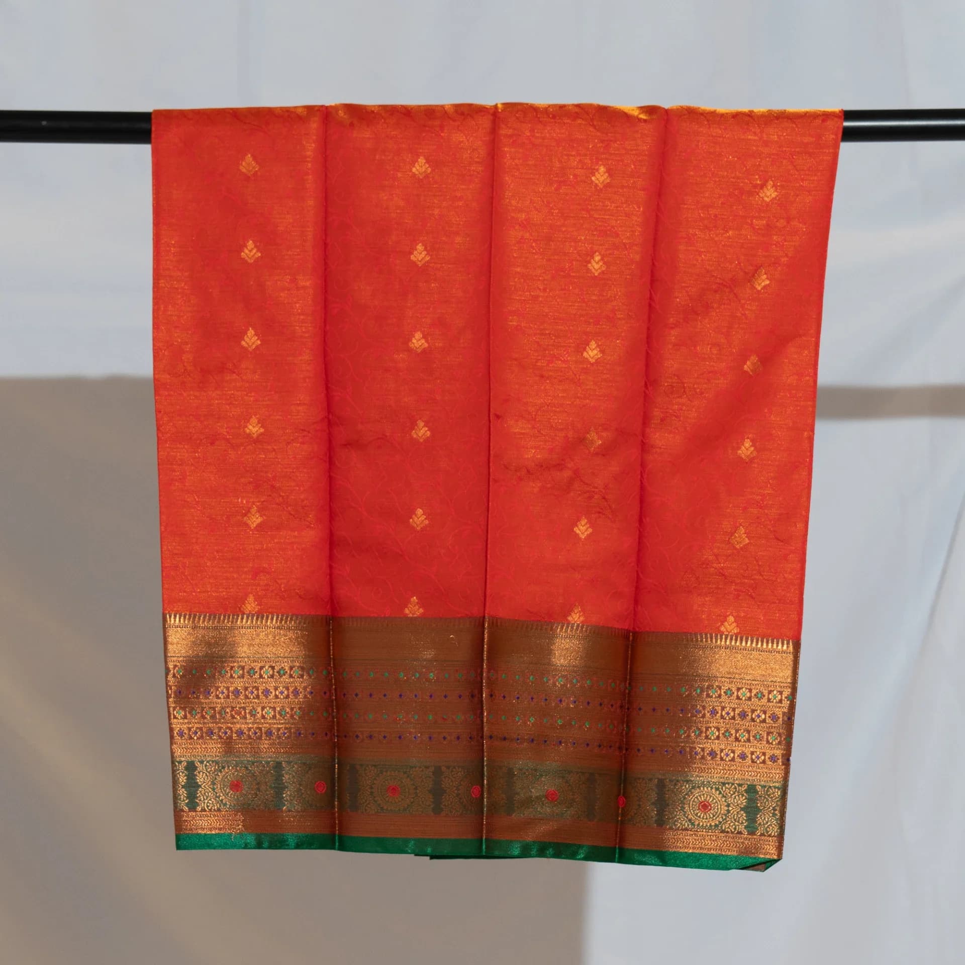 Deep Orange Saree with Copper Work & Contrast Green Pallu