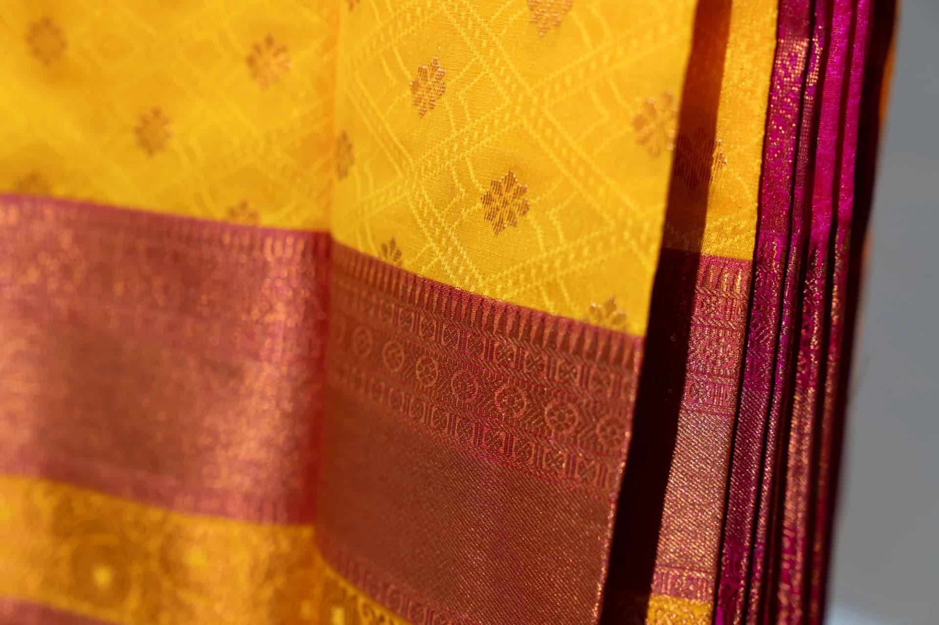 Yellow Saree with Copper Work & Contrast Pink Pallu