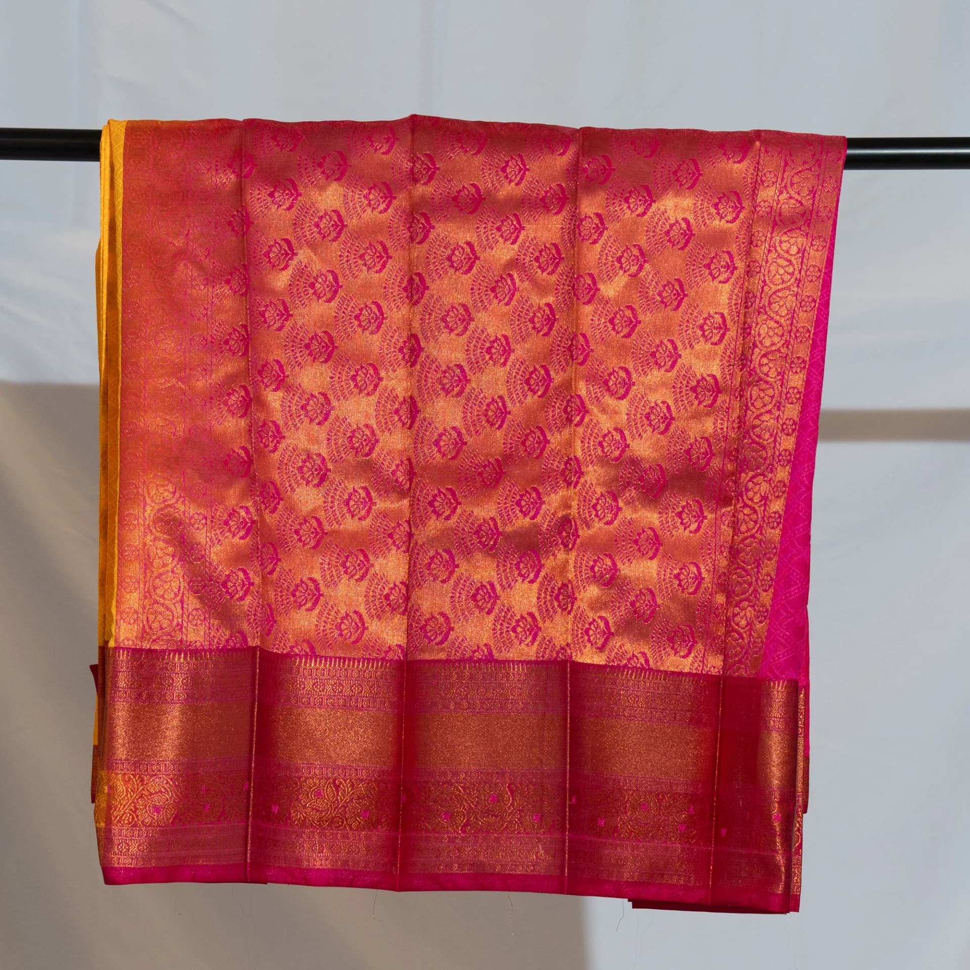 Yellow Saree with Copper Work & Contrast Pink Pallu