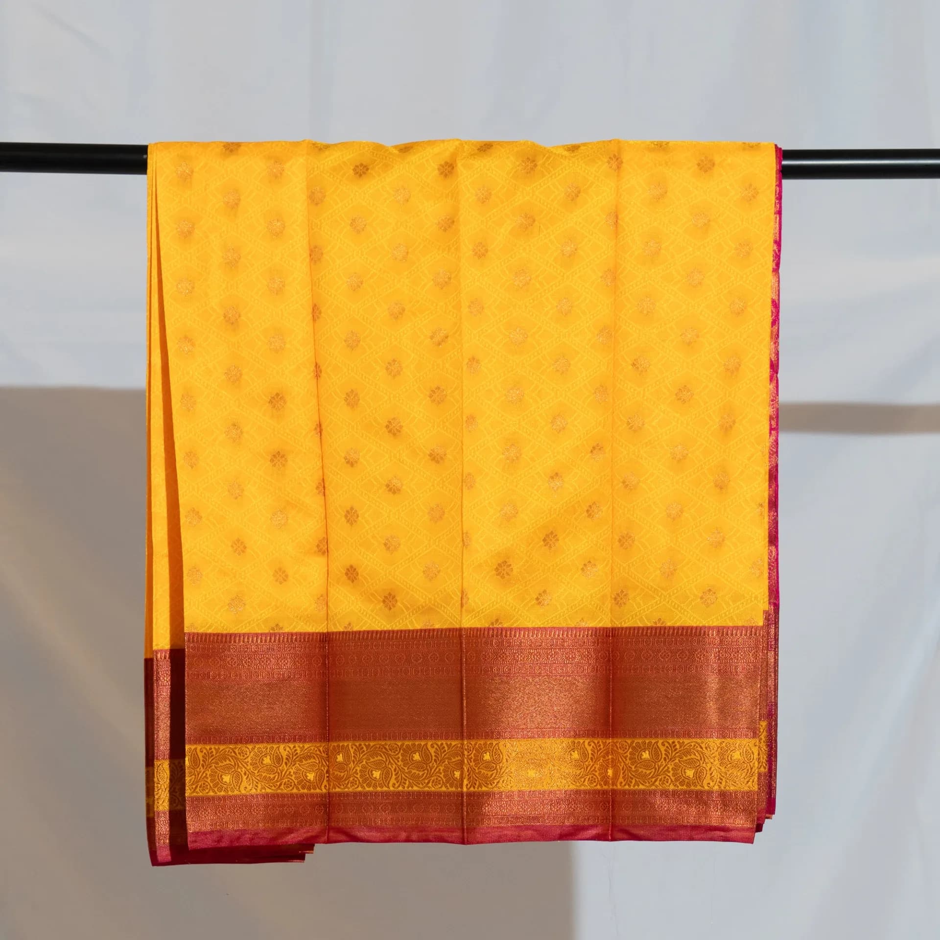 Yellow Saree with Copper Work & Contrast Pink Pallu