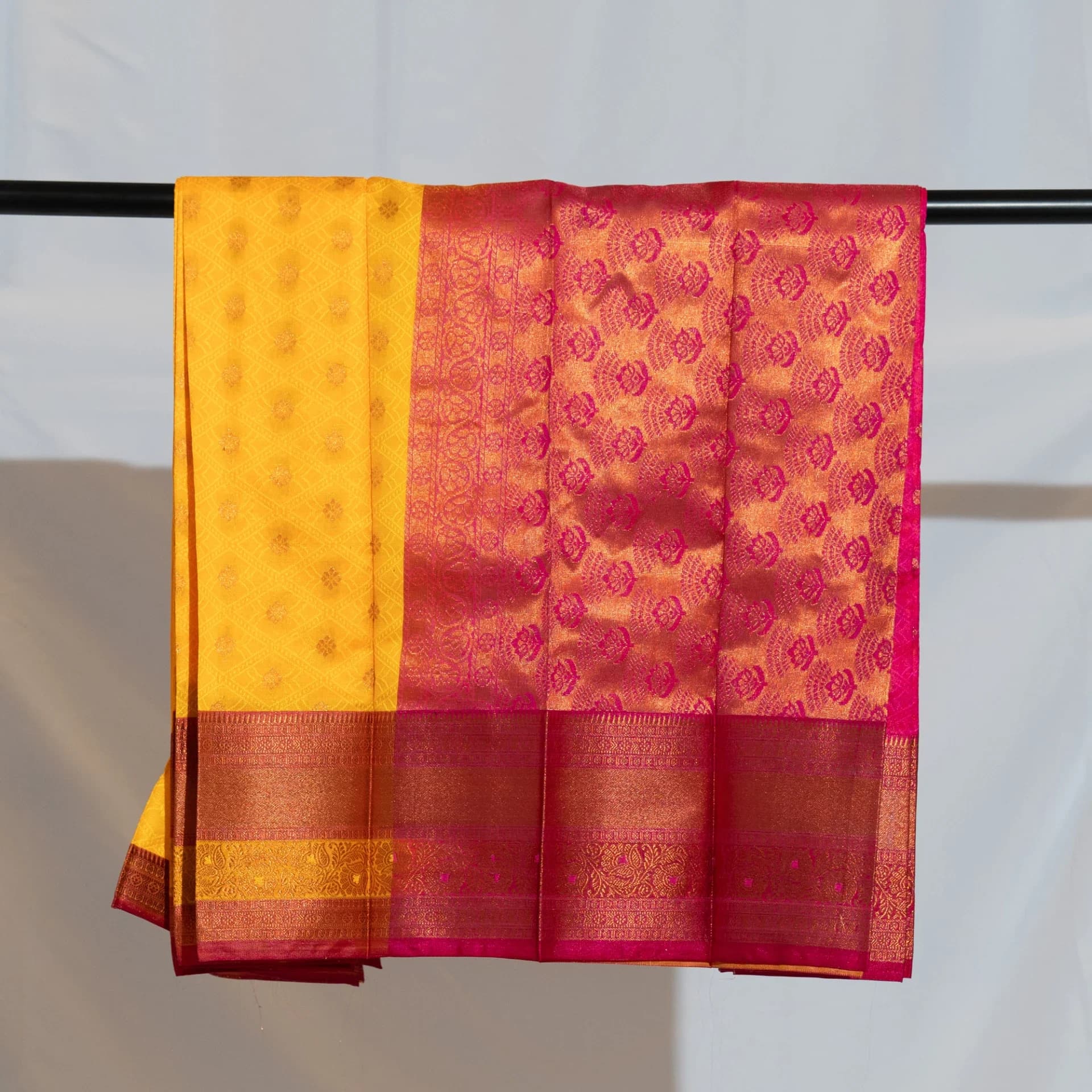 Yellow Saree with Copper Work & Contrast Pink Pallu