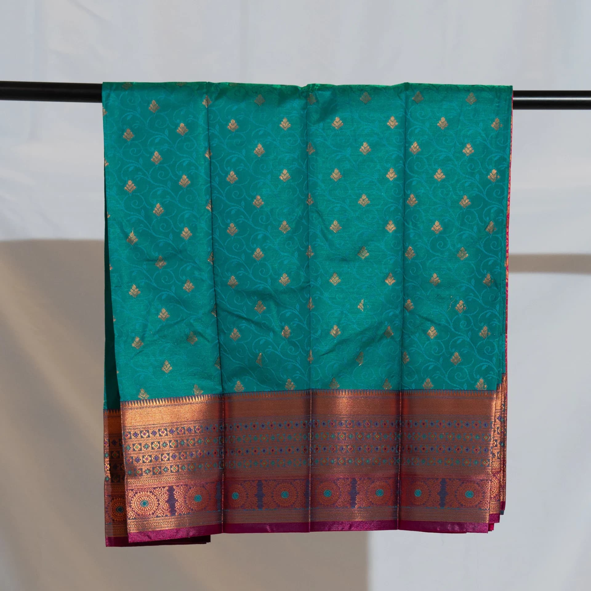 Teal Green Saree with Copper Work & Contrast Pink Pallu