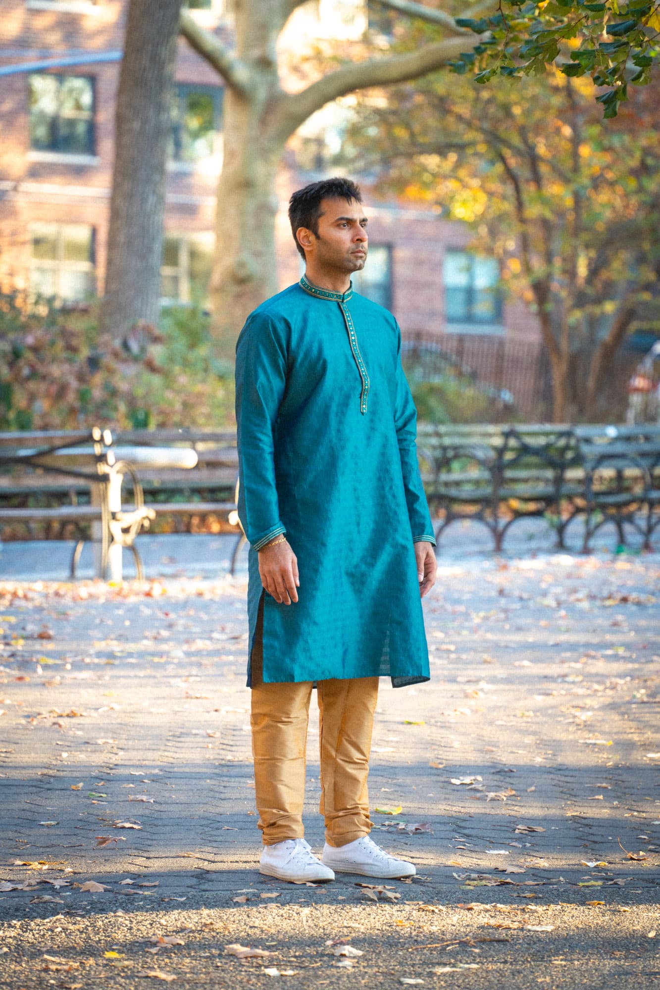 Teal Green Kurta with Gold & Mirror Work Details