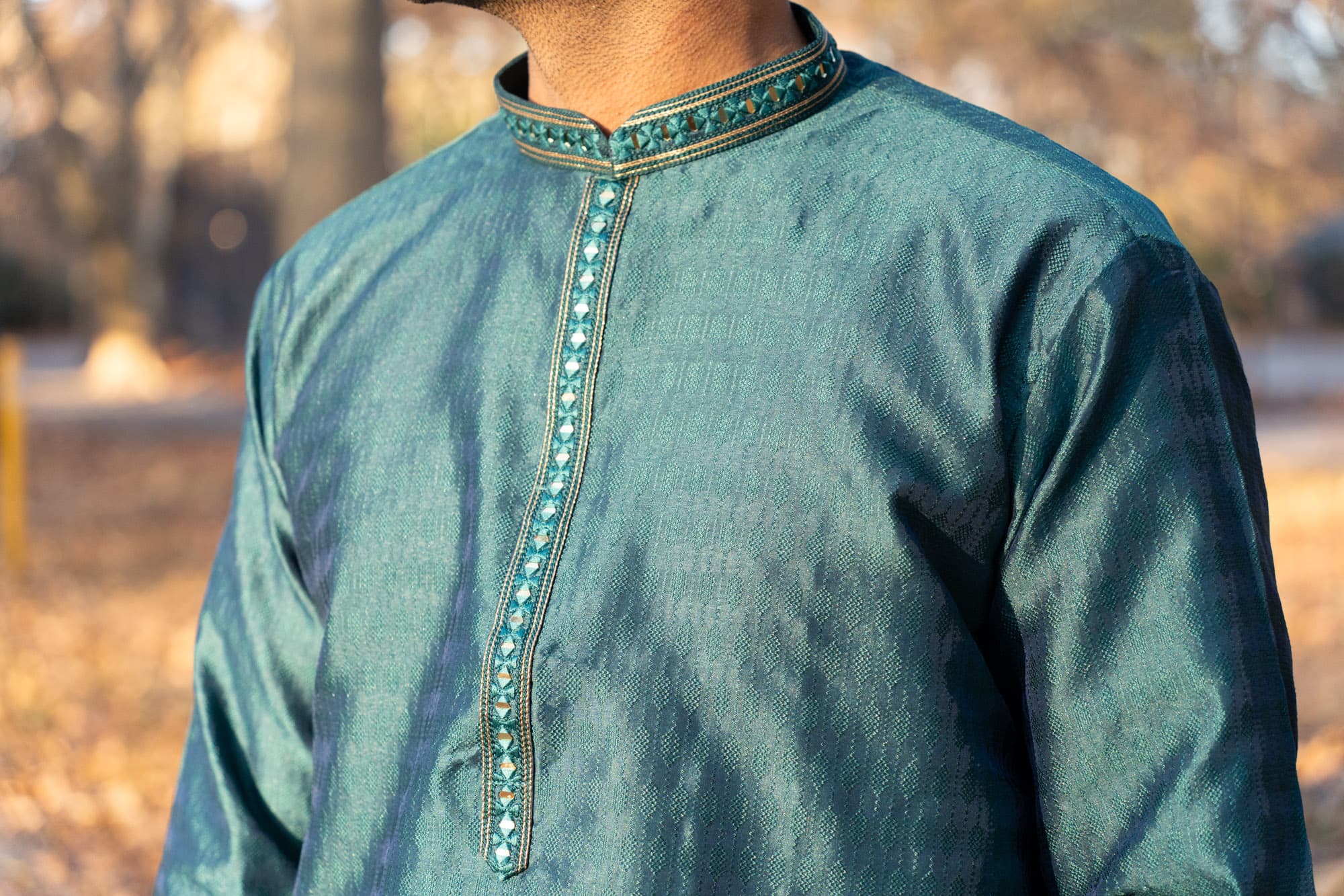 Teal Green Kurta with Gold & Mirror Work Details
